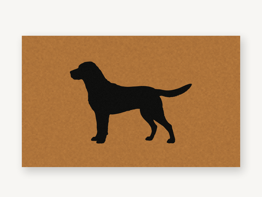 Labrador silhouette coir doormat at a boot room door